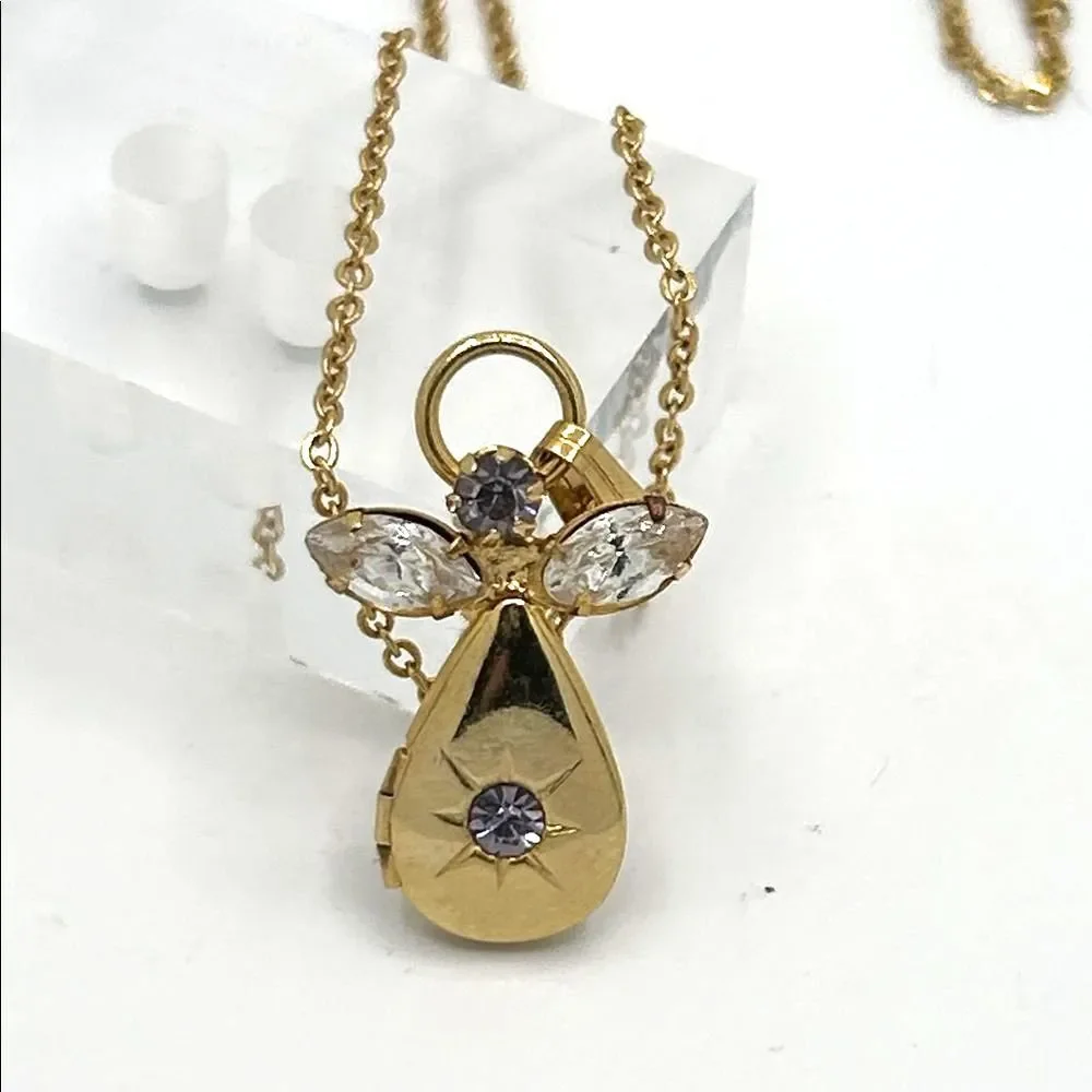 Vintage gold tone angel pendant locket birthstone necklace - purple rhinestone